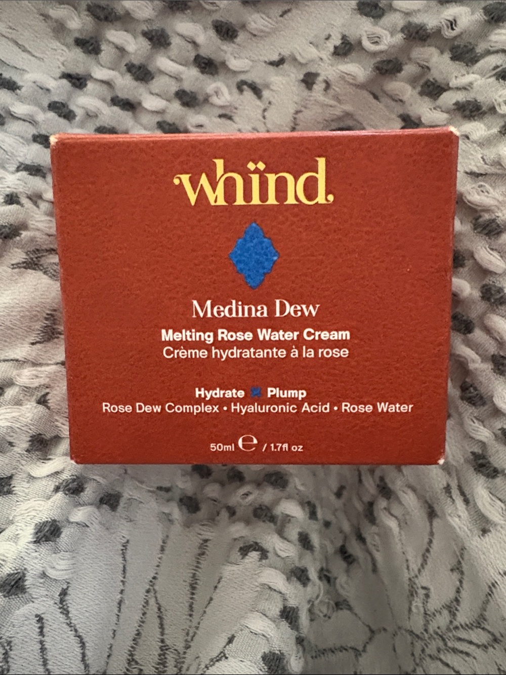 Whind Medina Dew Melting Rose Water Cream — red with blue accent